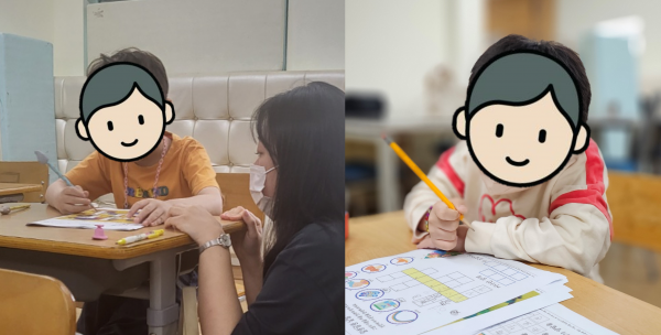 공부에 열중하고 있는 두 아동의 모습