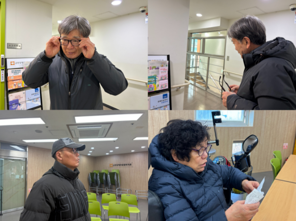 맞춘 안경을 만족해하는 모습